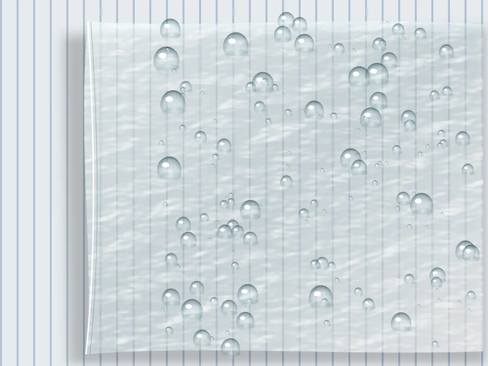 Water beading on the clear film, laid over a striped school-shirt fabric.